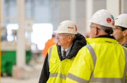 Tom Boldt with two other Boldt employees in safety gear