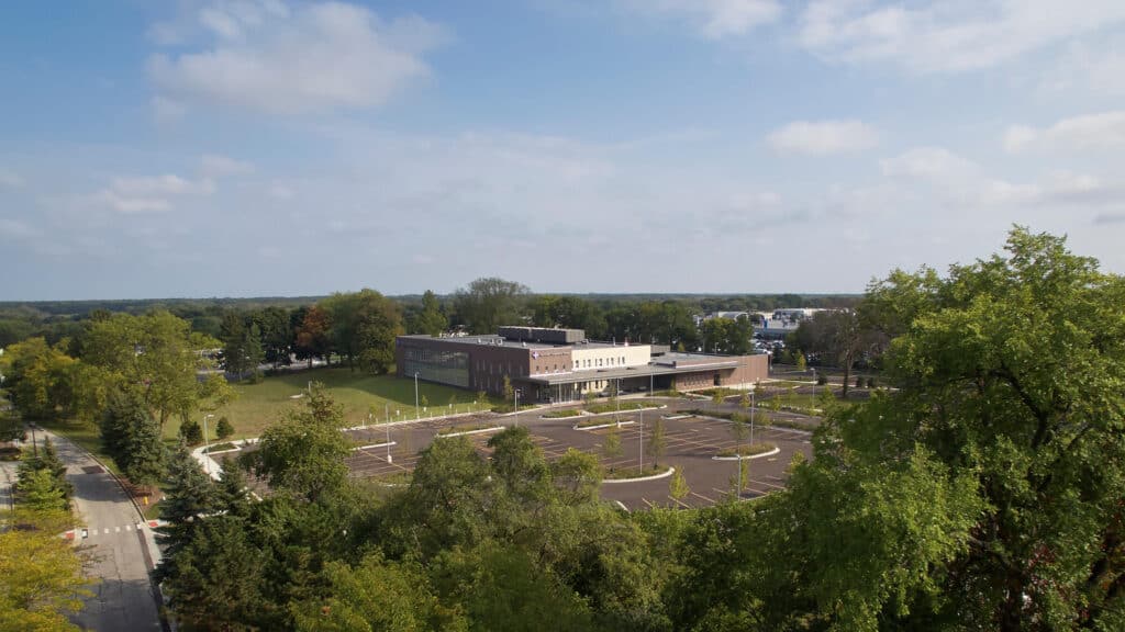 preconstruction services - site selection: aerial view of medical building and surrounding area