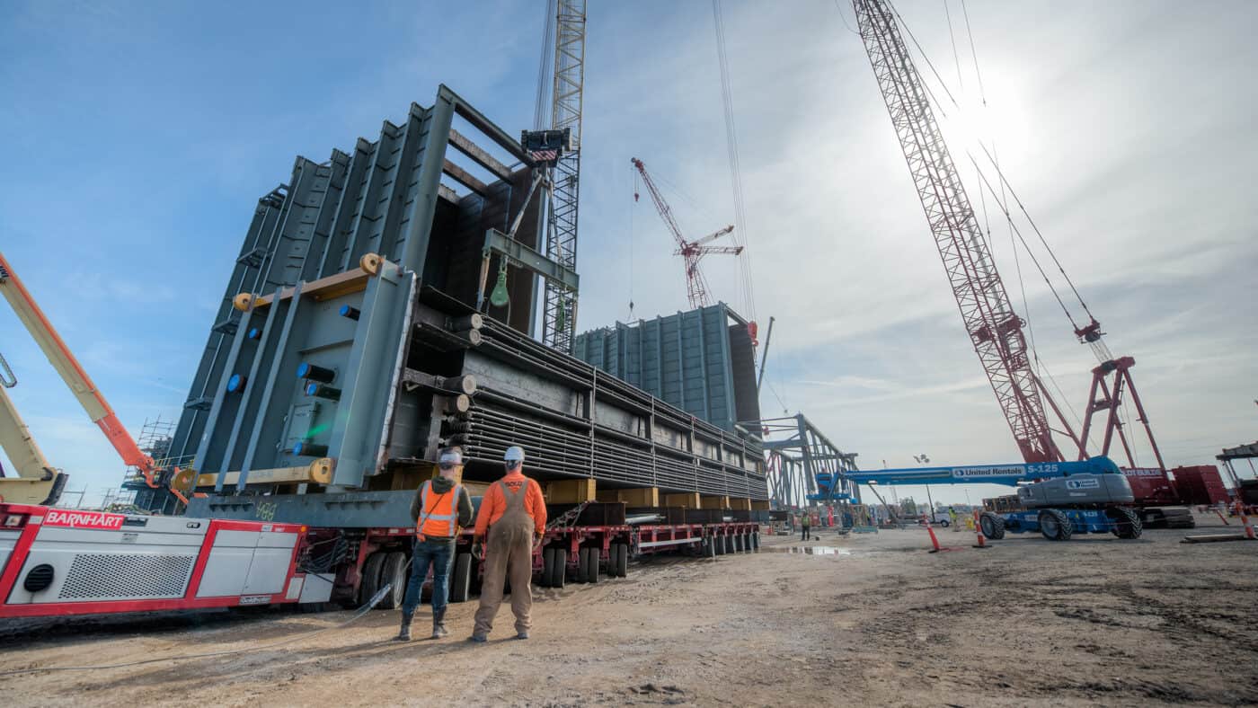 Alliant Energy - West Riverside Construction - Two Workers, Three Cranes