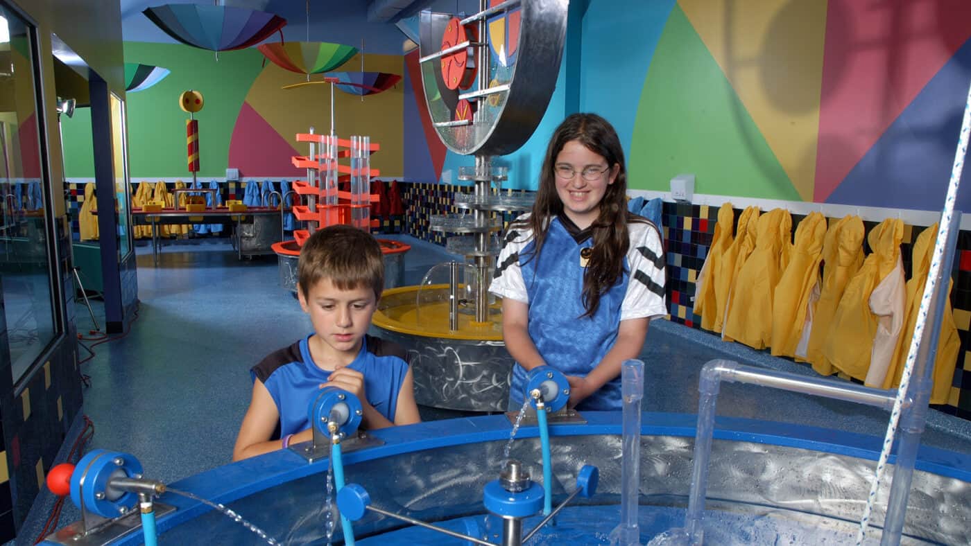 Appleton Building for Kids - Two Children Play with Water Area