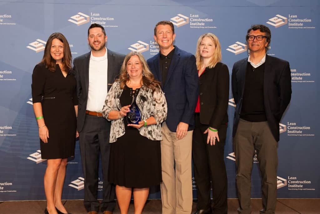 Group photo of Boldt team accepting Lean Construction Institute Award