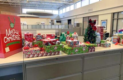 Boldt Stevens Point employees volunteering for Operation Bootstrap holiday gift-wrapping