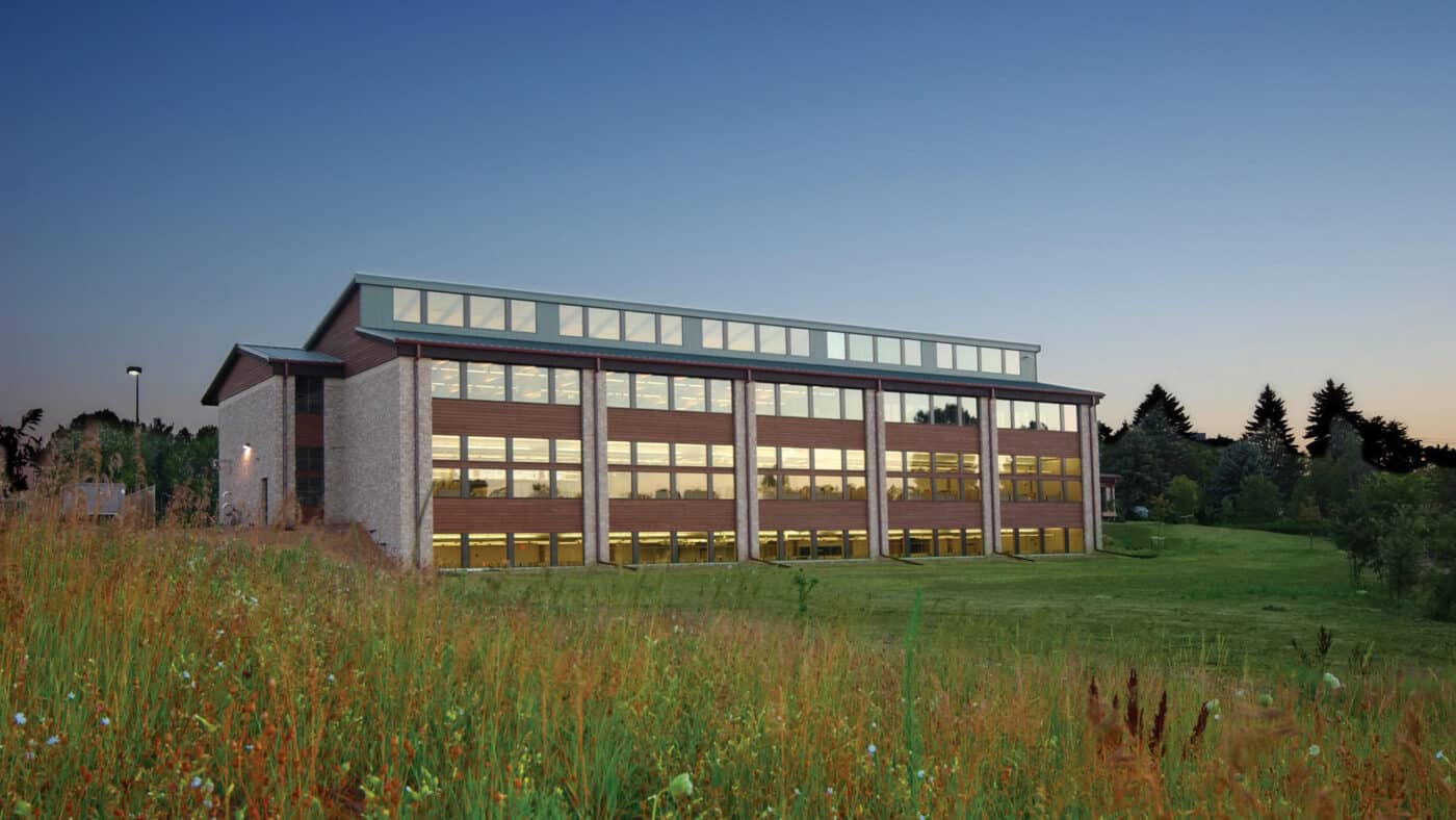 DNR Regional Headquarters and Service Center Exterior from Prairie at Dusk