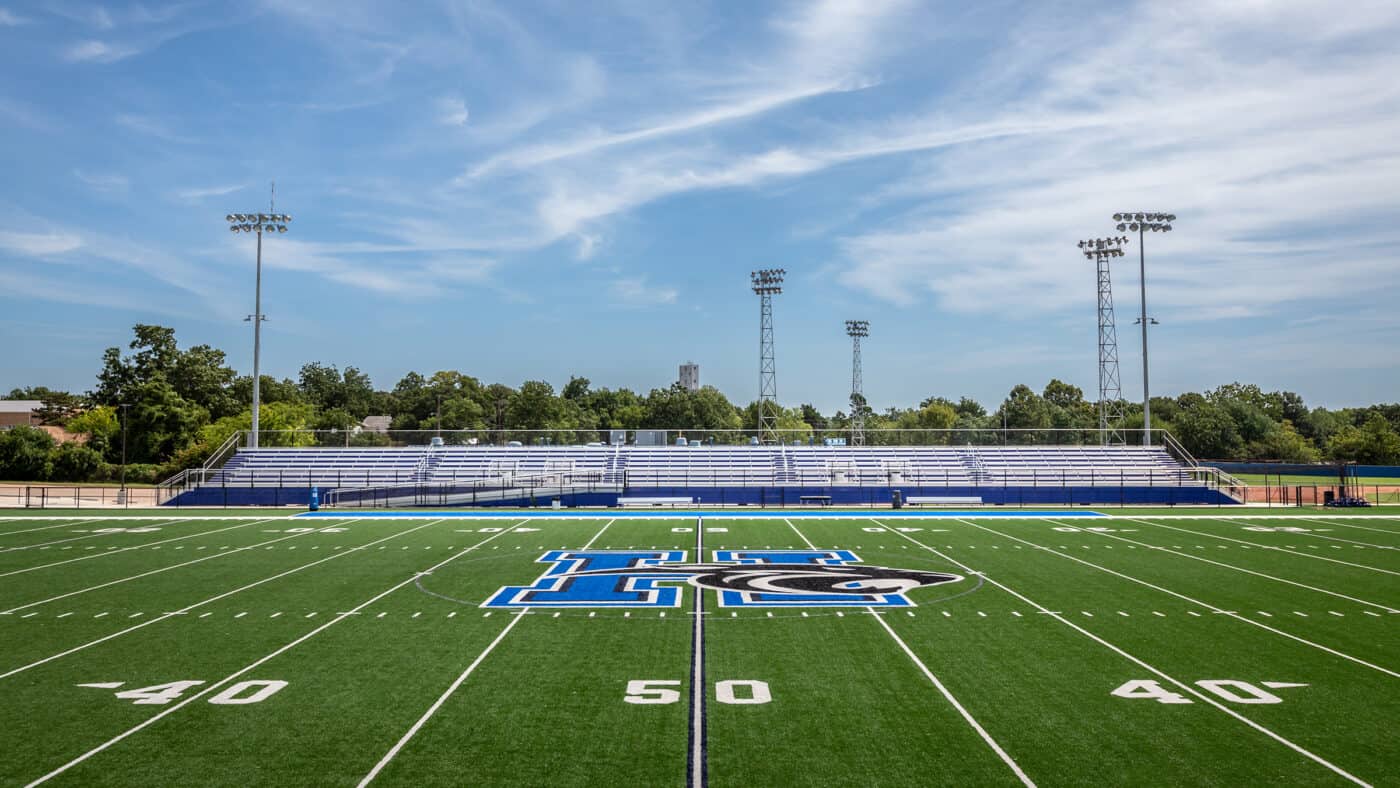 Harrah Public Schools - Evans Field 50-Yard Line