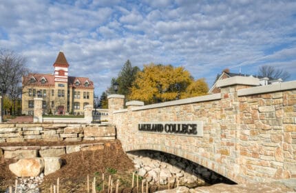 Lakeland University - Campus Entrance Redevelopment Construction of Stone Bridge with Signage with View of Campus