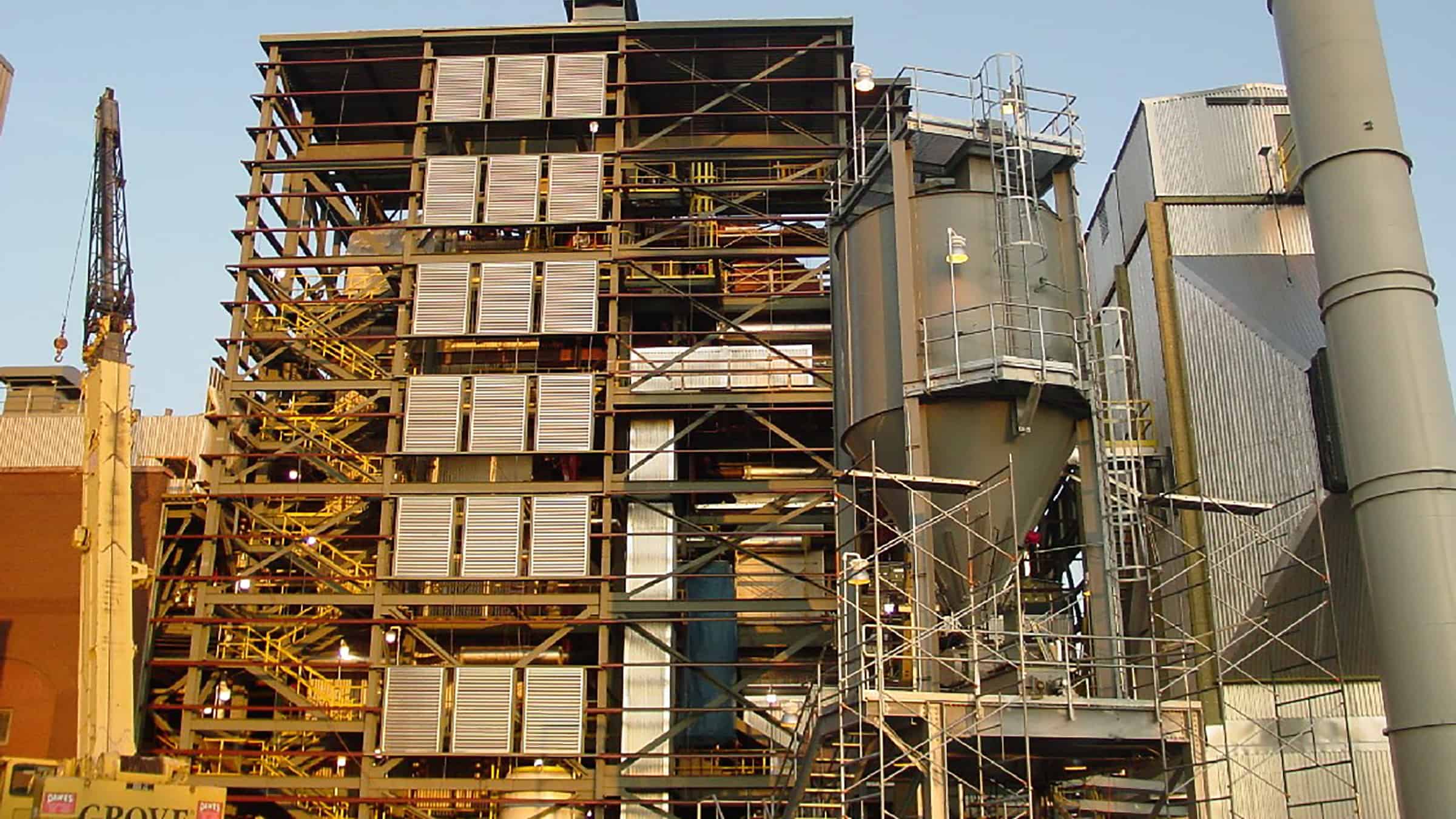 Laurentian Energy Authority - Biomass Energy Generating Facilities Exterior Facility View with Stack and Crane