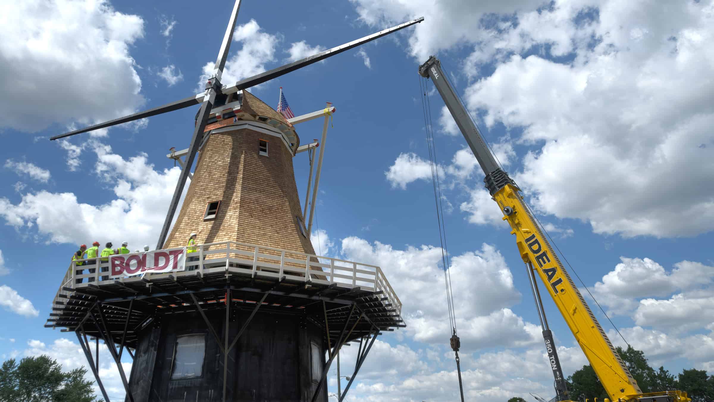 Little Chute Windmill and Van Asten Visitor Center with Roof and Windmill in Place and Crane in Background