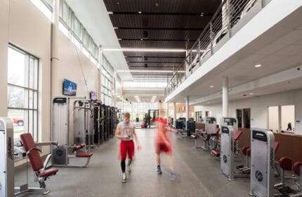 Ripon College - Athletic & Wellness Center Interior Fitness Equipment Area with Mezzanine with Additional Fitness Equipment