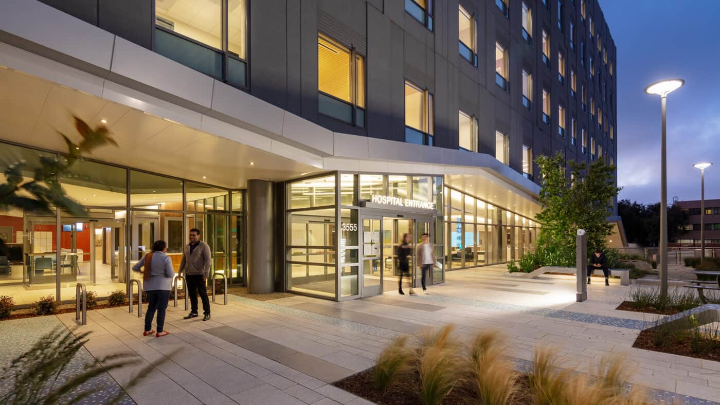 Sutter Health - CPMC - Mission Bernal Campus Hospital Exterior Entrance Lit at Night