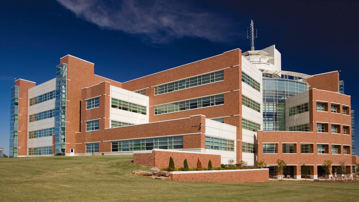 University of Oklahoma - National Weather Center - Research and Training Facility - Building Exterior View of Building on Site with Meteorological Equipment Visible on Roof