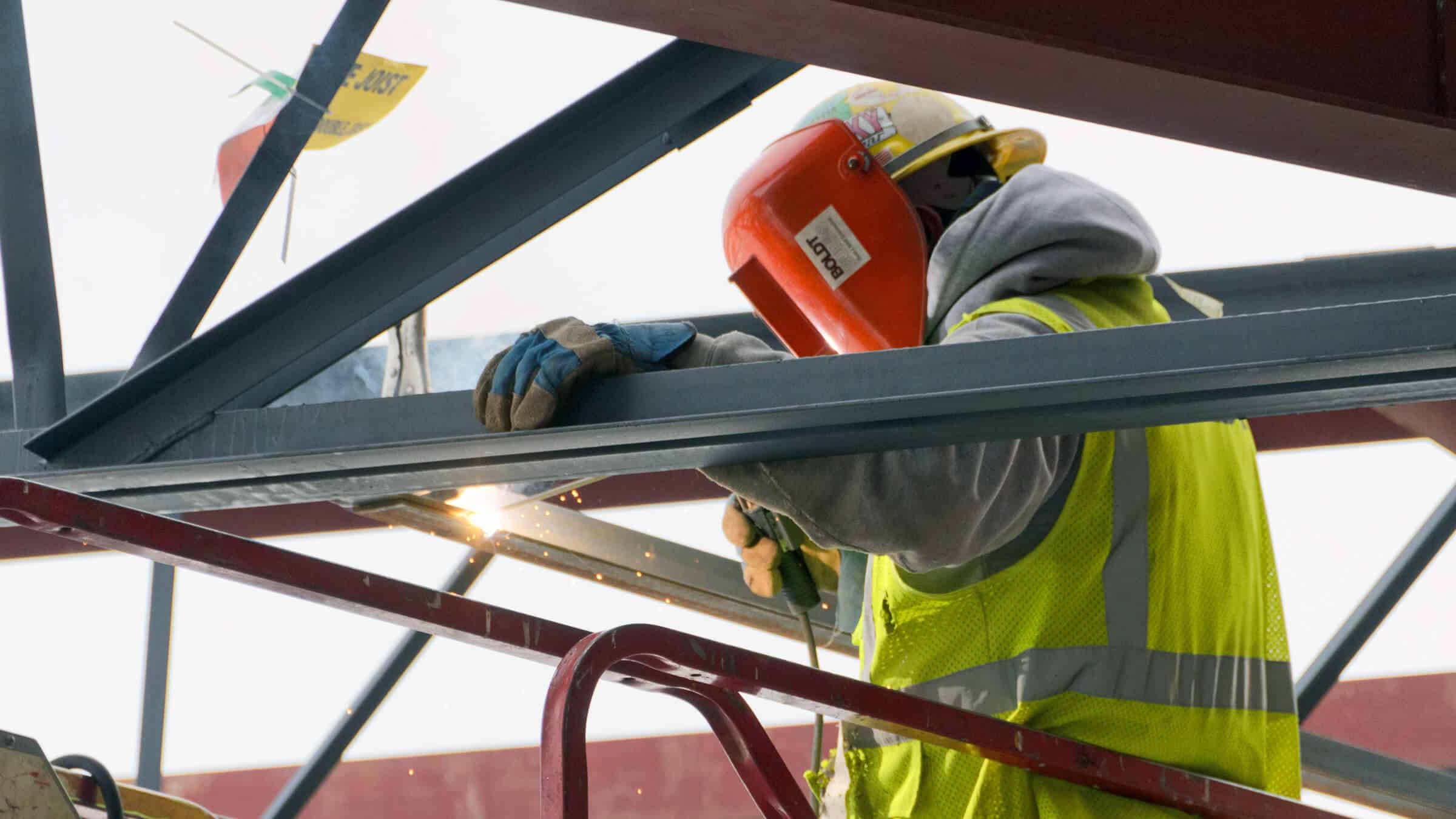 Welder working on construction site